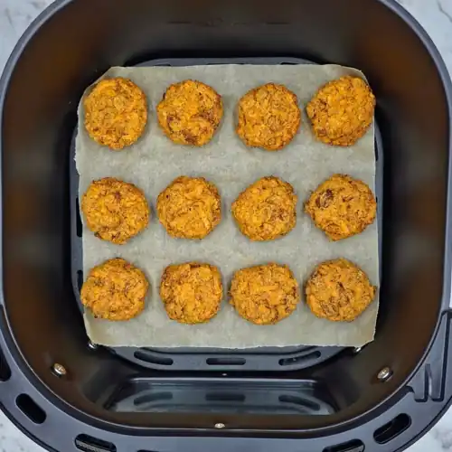  Veggie Nuggets baked in an air fryer on baking paper until crispy and golden brown. 